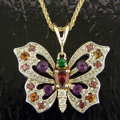 FGP612
.10 TW DIAMOND
TSAVORITE, CITRINE, RHODOLITE GARNET AND AMETHYST
YELLOW AND WHITE GOLD
SIZE: 1 1/16in. /26mm Wide
CATEGORY: PENDANT