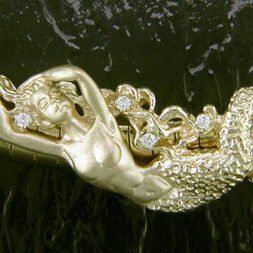 MS010
14K MERMAID SLIDE
W/.20TW DIAMONDS
SIZE: 2 3/16in. /55mm Wide